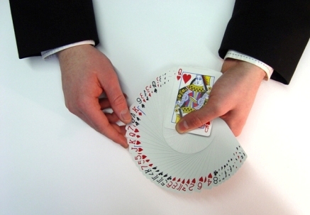 Fan of cards by close up magician