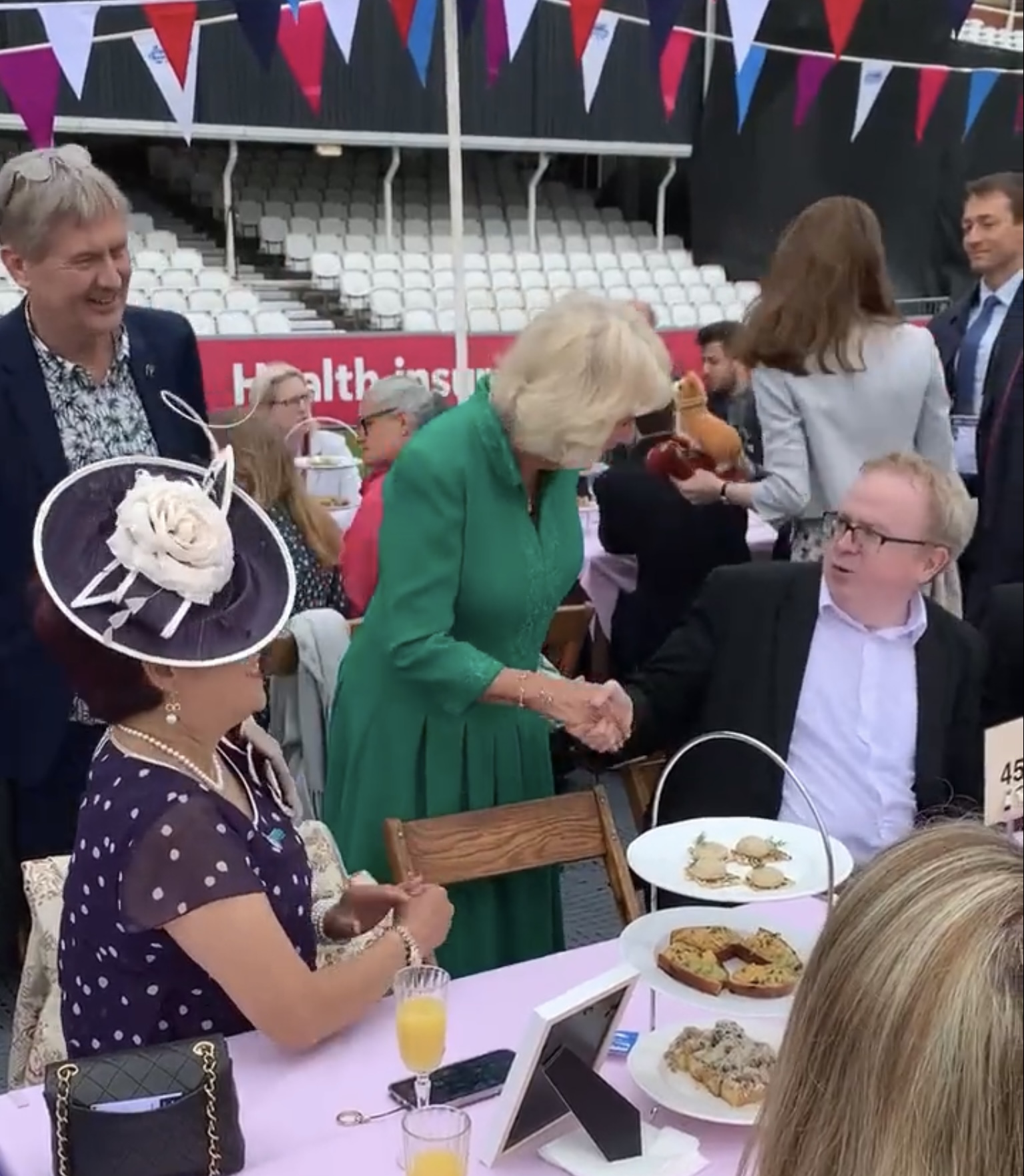 Magician Noel Qualter being thanked by Camilla the Duchess of Cornwall for entertaining at the Queen's Platinum Jubilee at the Oval Cricket Ground